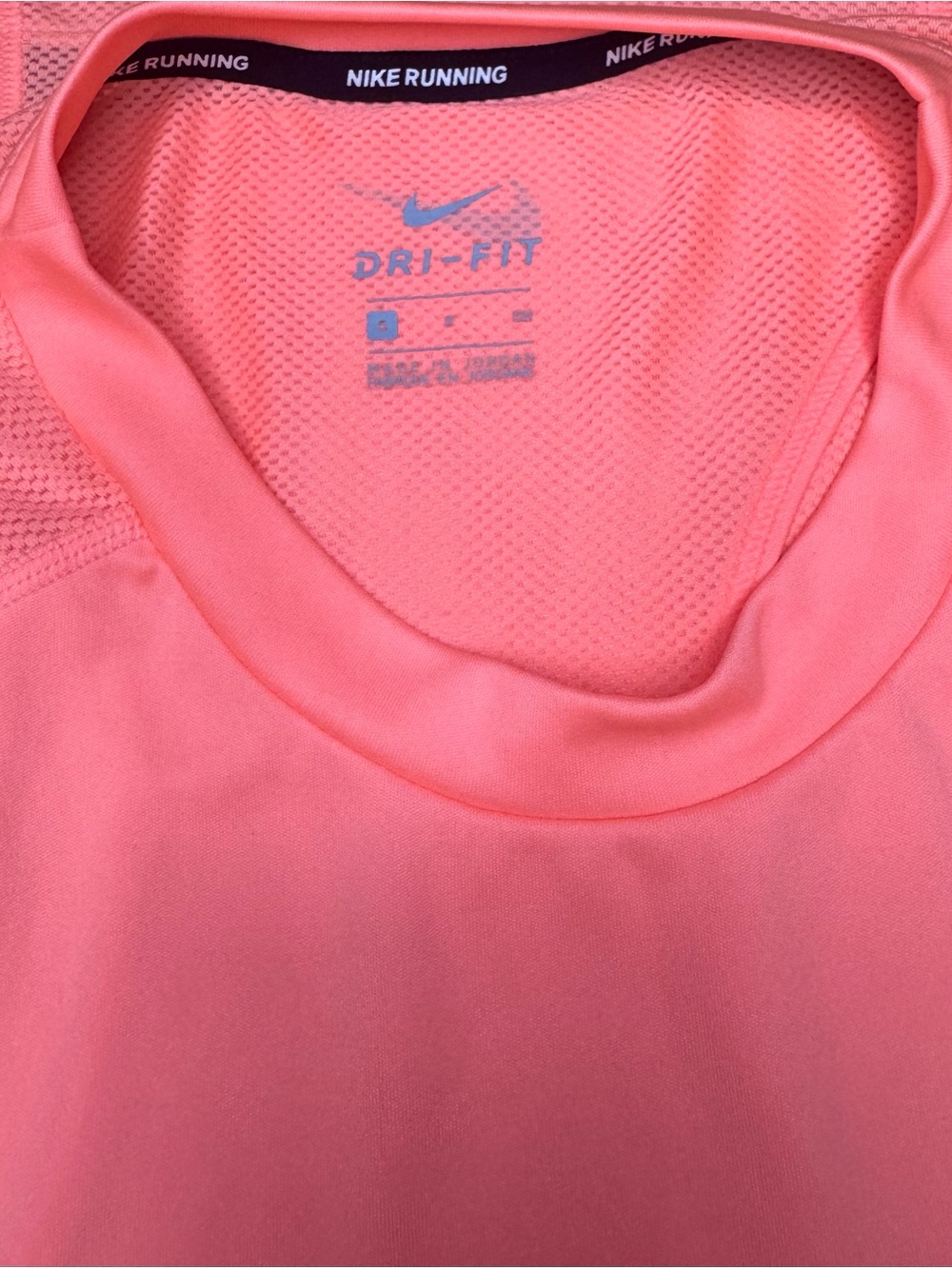 Nike Dri-FIT women’s running tank top in a bright coral/salmon color - Picture 4 of 4